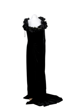 Show details for Elegant Marchesa black velvet gown featuring a dramatic floral appliqué neckline and floor-length silhouette with train. Picture of Elegant Marchesa black velvet gown featuring a dramatic floral appliqué neckline and floor-length silhouette with train.